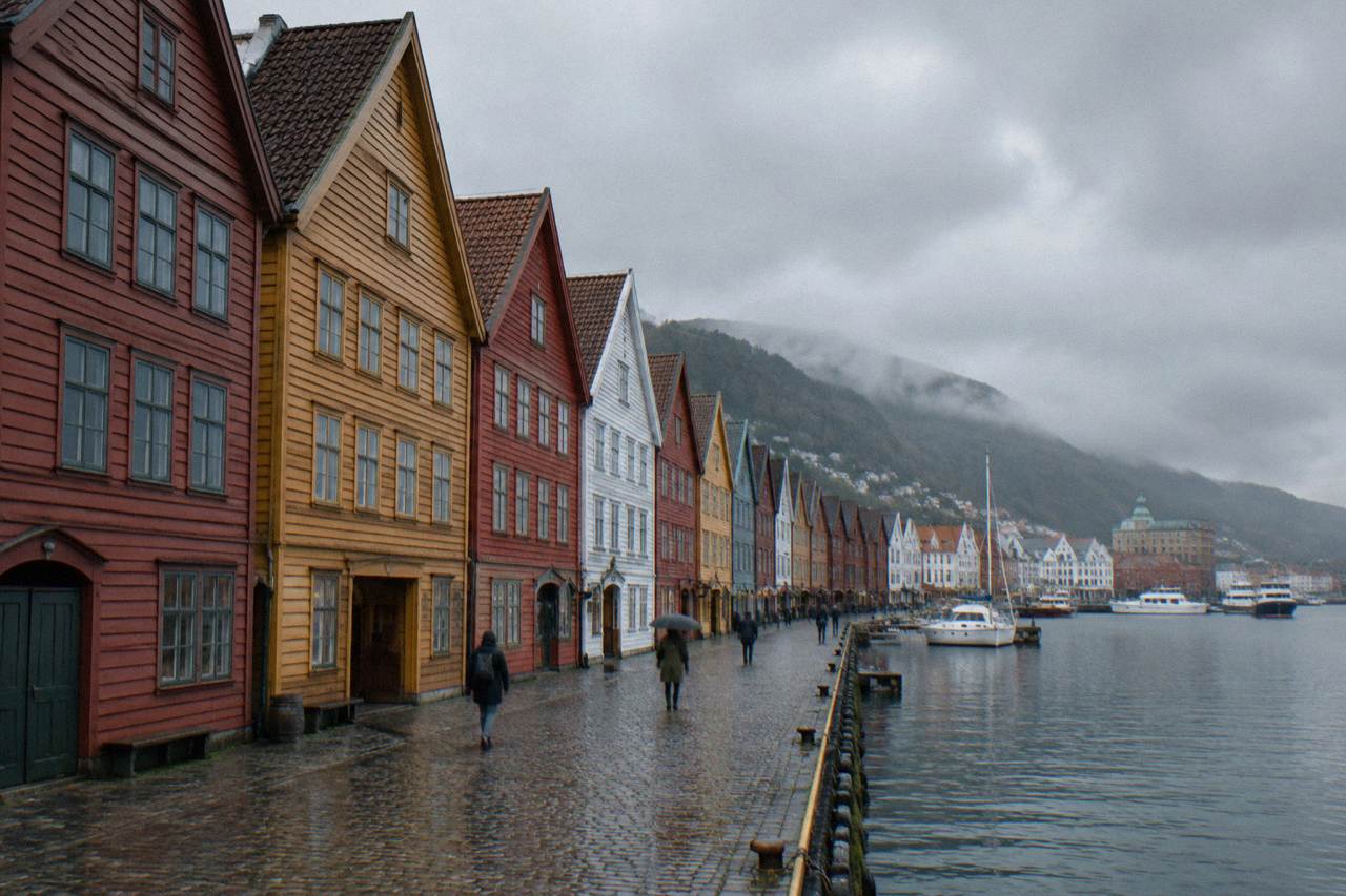 Colourful wooden Hanseatic buildings along the Bryggen wharf in Bergen on a bright day