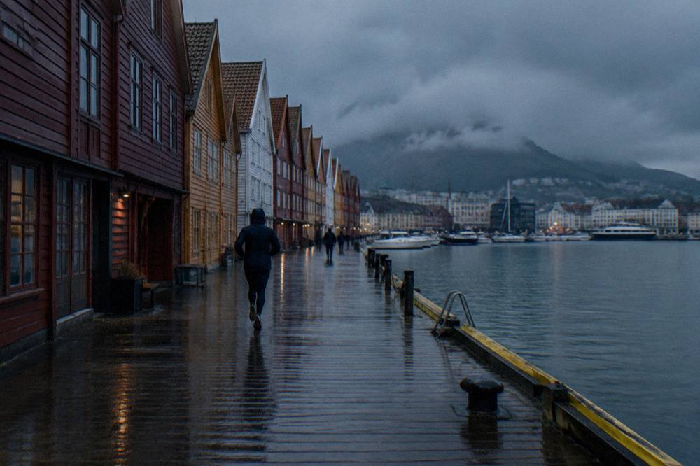 Wooden gabled warehouses along the Hanseatic wharf in Bergen on an overcast day
