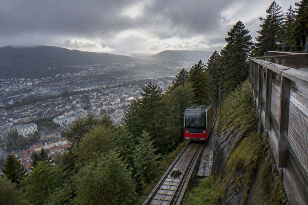 The Fløibanen funicular railway climbing the forested hillside above Bergen's rooftops