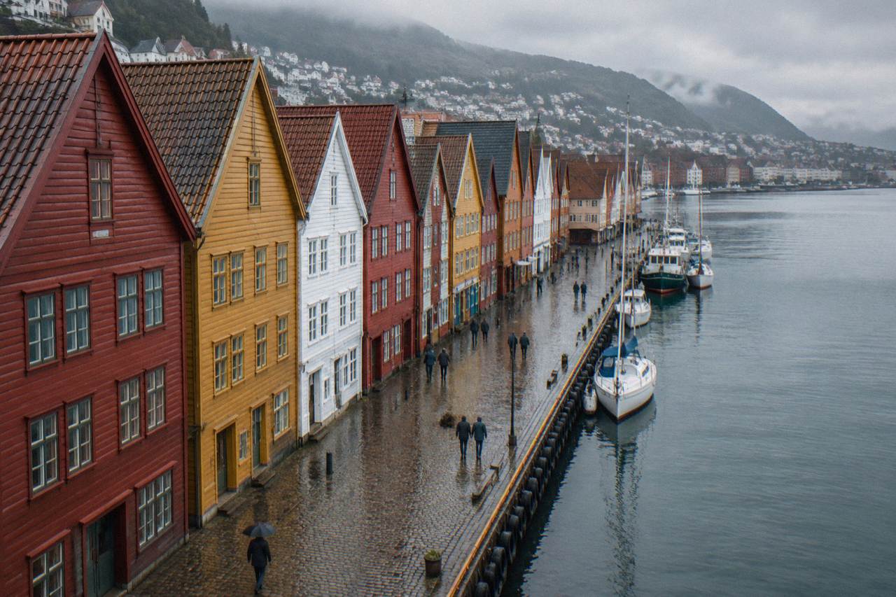 Colorful wooden Hanseatic buildings along the Bryggen wharf in Bergen on a bright morning