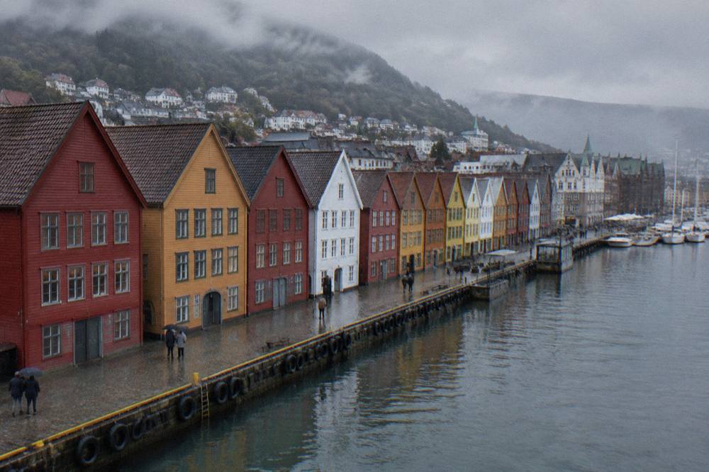 Colourful wooden houses on the Bryggen wharf in Bergen seen from the harbour