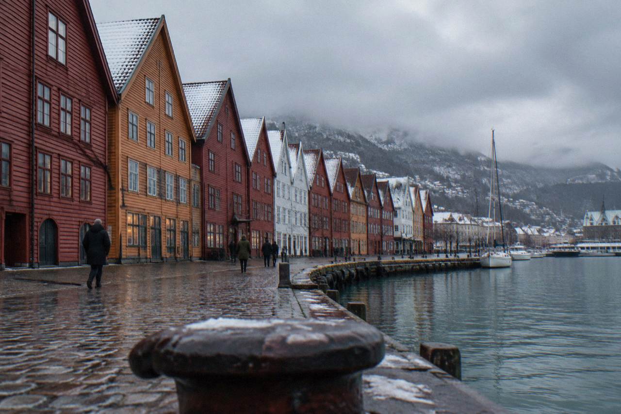 Bergen's Bryggen wharf on a cold winter day with snow dusted on the gabled timber roofs