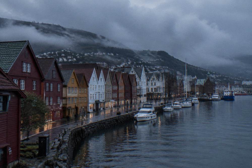 Painted historic wooden buildings along the Bergen waterfront near the museum district