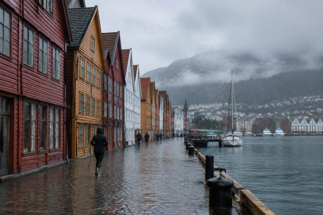 Colourful wooden Hanseatic houses along the Bryggen wharf in Bergen on an overcast day