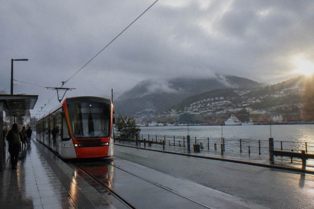 A Bybanen light rail tram waiting at a street stop in central Bergen