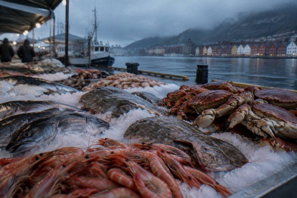 Fresh seafood displayed on ice at an outdoor market stall in Bergen