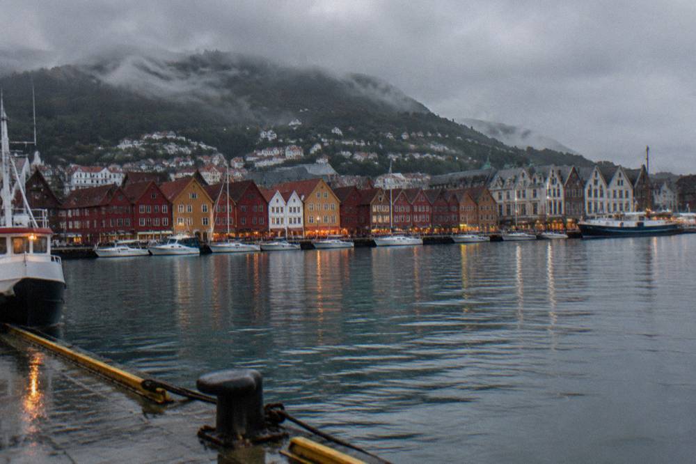 Evening light on the historic wharf buildings of Bergen seen across the water
